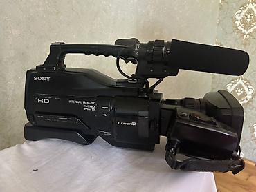 sit ustu monitor: Sony HXR-MC1500 peşəkar videokamera - Sensor və görüntü: Exmor R — 1