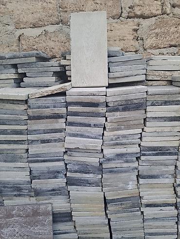 hazır tonqal: Beton/klinker tipli döşəmə və fasad plitələri.56.kvadratdı.cəmi 250m — 1