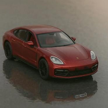 100 evra: Porsche panamera bordeaux red luksuzni model auta 1:24. porsche — 1