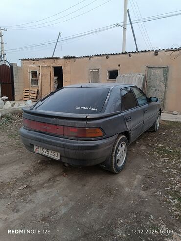 Mazda: Mazda 323: 1991 г., 1.6 л, Механика, Бензин, Хэтчбэк — 17