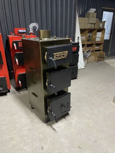 Буржуйки: Твердотопливный котел Thermo Gradus с тремя дверцами для загрузки
