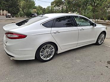 Ford: Ağ rəngdə Ford Fusion sedanı. Bu avtomobilin salonda rahat -da lalafo.az — 13 Ford: Ağ rəngdə Ford Fusion sedanı. Bu avtomobilin salonda rahat — 13