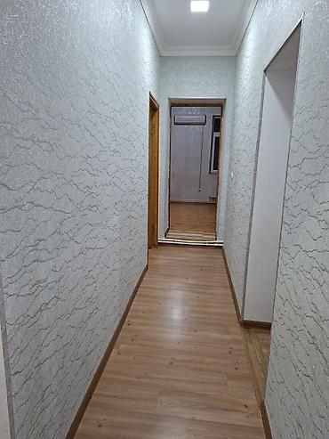 bakıda kreditle evler: 2 mərtəbəli binanın 1ci mərtəbəsi,qanuni 2 otaqlı,43kv+27kv artırma — 10