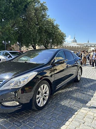 Hyundai: Hyundai Azera – biznes sinfi sedan Xüsusiyyətlər: - Korpusu: 4 qapılı — 3