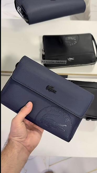 Lacoste kişi əl çantası - Material: teksturələnmiş sintetik dəridən