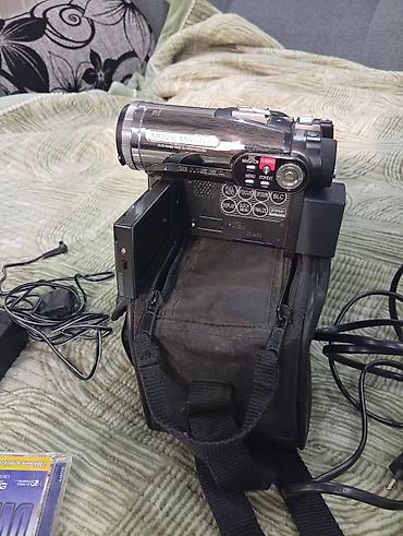 Видеокамеры: Видеокамера Hitachi Hybrid Camcorder DVD/HDD Особенности: - Гибридная — 1