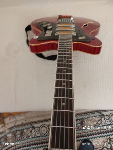 Elektro gitaralar: Elektron gitara, 6 sim, İşlənmiş, Ünvandan götürmə — 20
