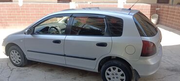 купить спортивную машину: Автомобиль Honda Civic в кузове хэтчбек, серебристого цвета. Модель