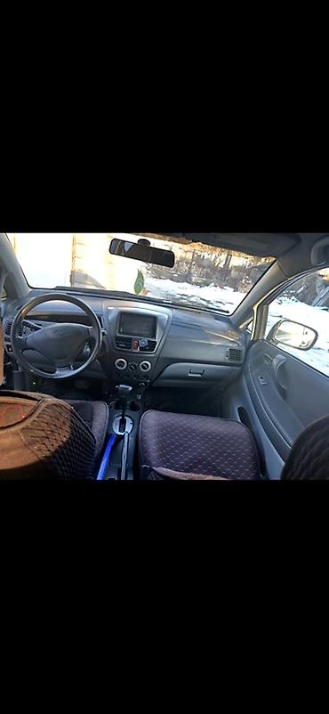 baic ec3: Продажа компактного седана черного цвета. Основные особенности: - 4 — 3