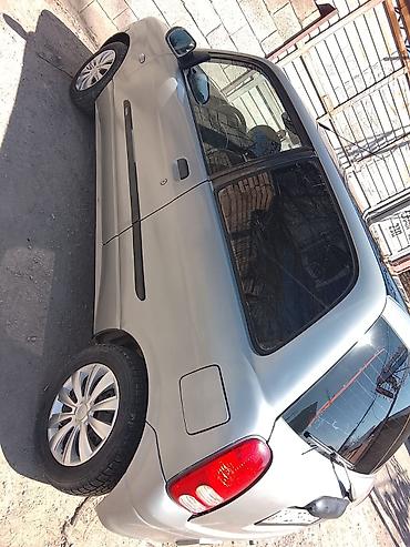 трёхдверный: Daihatsu Cuore: 2002 г., 1 л, Автомат, Бензин, Хэтчбэк — 4