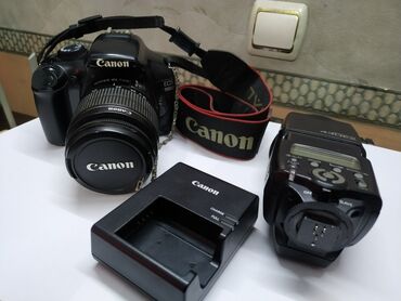 tsifrovoi fotoapparat canon powershot: Canon 1100 d.az islenmish.vspiskayla nirlikde satilir.Real aliciyla