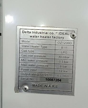 termogas pitiminutka: OLYMPIC Electric qazla işləyən axın su qızdırıcısı - Model: OZ1206D — 3