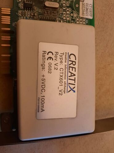 Druga oprema za računare i laptopove: Stari retro modem i adapter za kompjuter.

Nepoznato stanje — 15