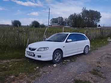 пороги демио: Mazda Familia: 2000 г., Бензин, Универсал — 2
