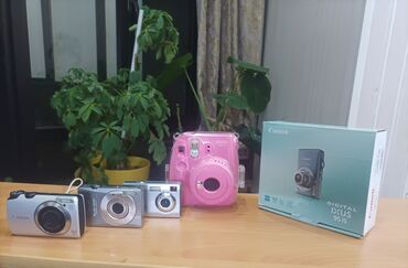 Фотоаппараты: Продается комплект фотоаппаратов: 1. Canon IXUS 95 IS – новый, в