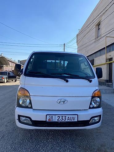 1000: Hyundai Porter II бортовой малотоннажный грузовик - Компоновка — 5