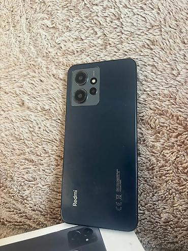 Mobil telefonlar: Xiaomi 12, rəng - Qara, 
 İki sim kartlı — 4