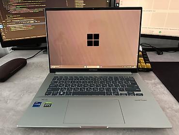14: ASUS Zenbook 14 (серия UX) — компактный алюминиевый ультрабук 14" — 1