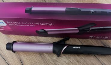 фен с вращающейся щеткой: Philips saç burğusu – geniş silindrli, tutacaq klipsli model. Rəngi