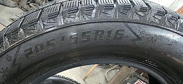 225 65 16 зима: Комплект зимних шин 205/65 R16. На фото представлены 4 автомобильные — 4