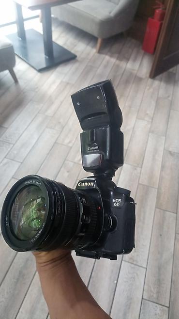 se 3: Canon EOS 6D с объективом Canon EF и накамерной вспышкой Canon — 1