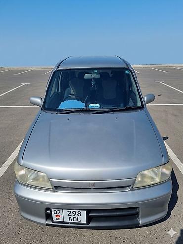 растрочка машина: Nissan Cube: 2000 г., 1.3 л, Автомат, Бензин, Минивэн — 6