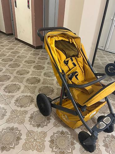 Uşaq arabaları: Uşaq arabası – Kidilo, sarı rəng Xüsusiyyətlər: - Geniş, rahat — 5