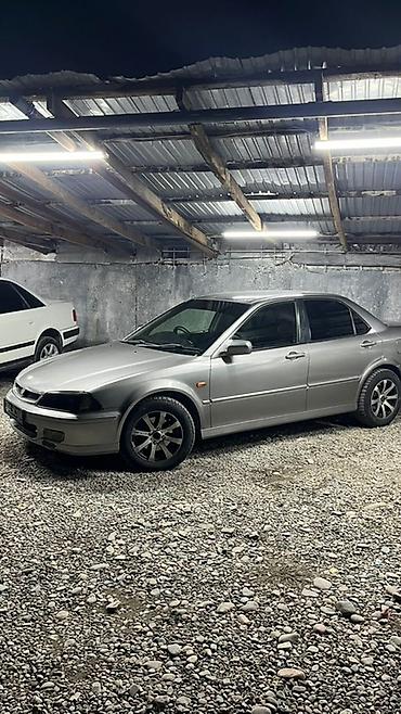 Другие автомобили: Седан серебристого цвета, 4 двери. Компактный и удобный для города — 10