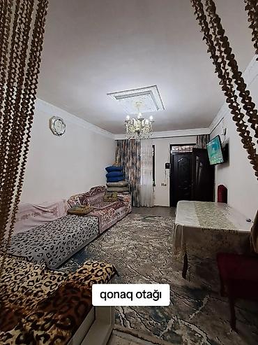 Bağ evlərinin satışı: Binə Savxozda 4 otaqlı ev satılır. - Geniş mətbəx: L formalı mətbəx — 12