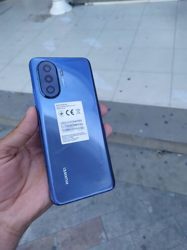телефон fly лягушка: Huawei Nova Y70, 128 ГБ, цвет - Голубой, Отпечаток пальца, Face ID