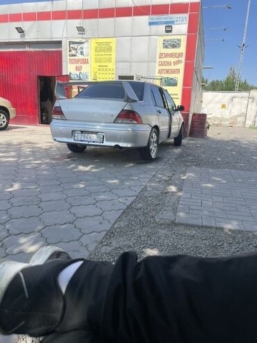 руль для лады: Mitsubishi Lancer: 2001 г., 1.6 л, Автомат, Бензин, Седан