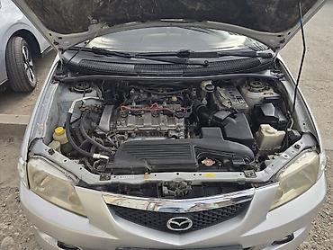 mazda 2000: Mazda PREMACY: 2002 г., 1.8 л, Механика, Бензин, Универсал — 7