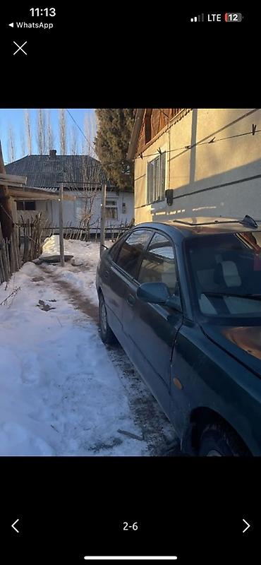 купить заднюю камеру на машину: Mazda 626: 1993 г., 1.8 л, Механика, Бензин, Седан — 2