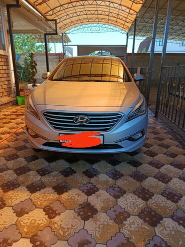 хундай малибу: Автомобиль Hyundai Sonata в цвете "серебристый металлик" с логотипом