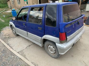 машина кейж: Автомобиль Daewoo Tico в кузове хэтчбек, окрашенный в синий цвет с