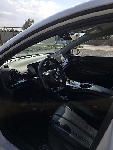 12000: BYD E2: 2024 г., Электромобиль — 5