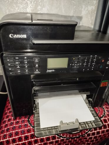 блоки питания для ноутбуков huawei: Многофункциональный принтер Canon i-SENSYS, выполненный в черном