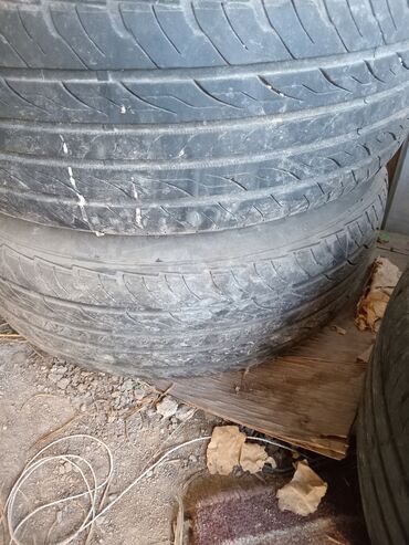 шины 2356516: Комплект из четырех автомобильных шин размера 205/65R16 97H. Покрышки