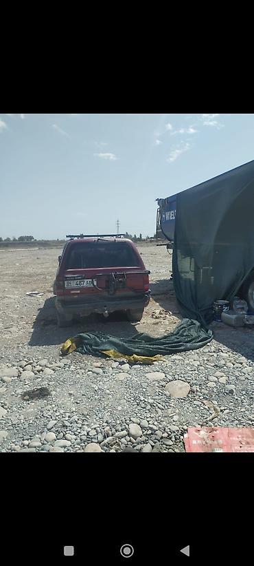 исузи му: Внедорожник Isuzu MU/Wizard (5 дверей), бордовый цвет. Основные — 2