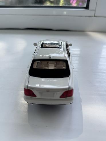 оюнчук машине: Машинка Toyota Crown Игрушечная машина тойота краун Открываются все — 4