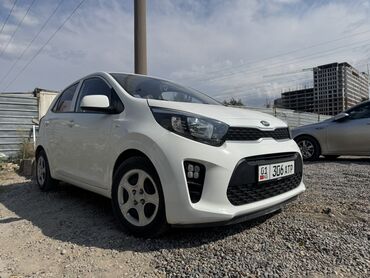 тойота айго цена бишкек: Белый городской хэтчбек Kia предназначенный для комфортного