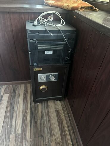 электро инстурменты: Многофункциональное устройство Brother MFC-L2700DW в черном цвете. Оно