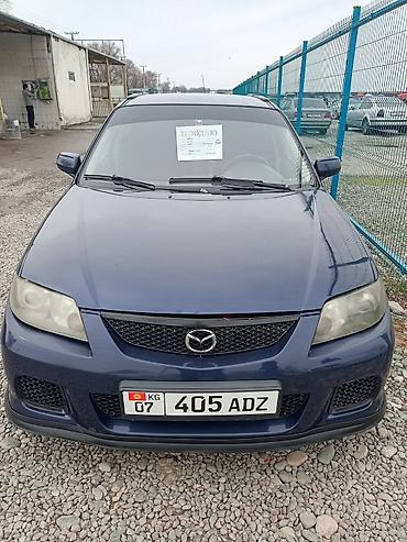 Mazda: Mazda 323: 2002 г., 1.6 л, Механика, Бензин, Хэтчбэк — 11