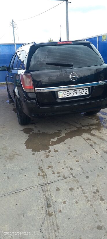 Opel: Opel Astra H Caravan (universal) –1.3 dizel Xüsusiyyətlər: - Kuzov — 11