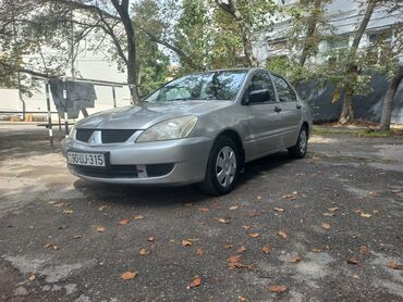 спойлер мазда демио: Mitsubishi Lancer: 1.3 л | 2006 г. Седан