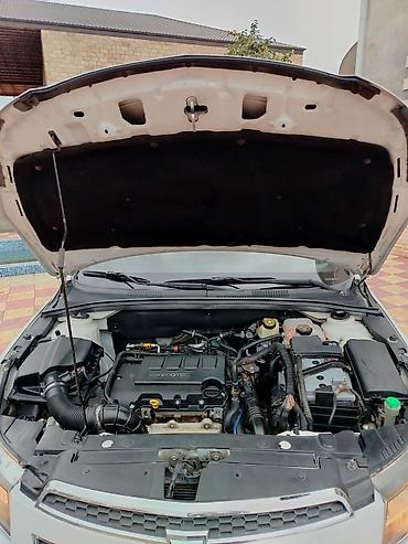 cobalt bar: Chevrolet Cruze: 1.4 l | 2014 il 210000 km Sedan — 4