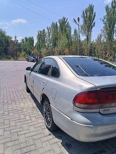 cron: Mazda 626: 1992 г., 1.8 л, Механика, Бензин, Седан — 4