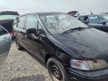 хонда одиссей сиденья: Минивэн Honda Odyssey черного цвета, предназначенный для перевозки