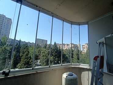 Ütüləmə lövhələri: Balkonlar və ya eyvanlar üçün nəzərdə tutulmuş, şüşə panellərdən