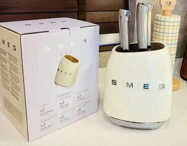 комплект стол: Набор ножей с подставкой SMEG ﻿​Наборы ножей с подставкой от SMEG —